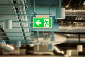 green exit sign, safety signs in the workplace